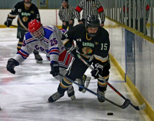 Ethan Doell breaks into the offensive zone while shrugging off a Beausejour check. The St Malo forward has eight points this season. (Cassidy Dankcohik The Carillon)