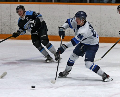 Ty Paisley looks to pass the puck during a Steinbach Pistons game against the Winnipeg Freeze earlier this season. The Steinbach-born forward was recently named to the Team Canada West initial roster for the 2022 World Junior A Challenge, the MJHL's only player. (Cassidy Dankochik The Carillon)